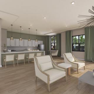 A modern open-concept living space featuring a seating area and a stylish kitchen with bar stools.
