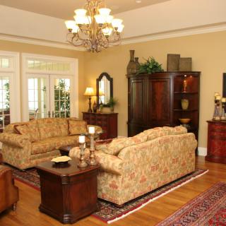 A classic-style living room with elegant furniture and decor.