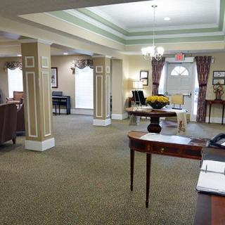 A well-furnished lobby with comfortable seating and elegant decor.