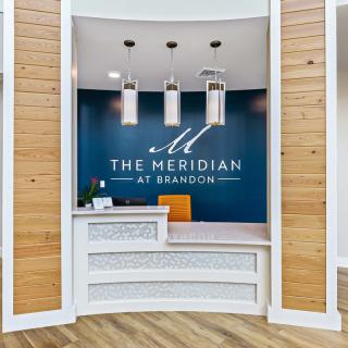 The Meridian at Brandon reception lobby showcasing elegant interior design.