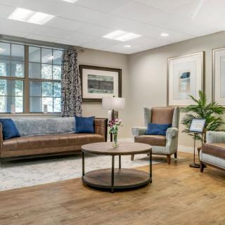 A modern living room with stylish furniture and decor.