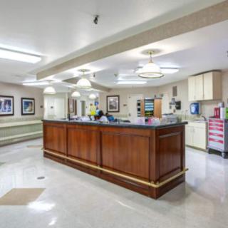 A clean and well-lit reception area in a hospital or healthcare facility.