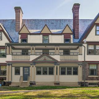 A beautifully designed historic mansion showcasing intricate architectural details.