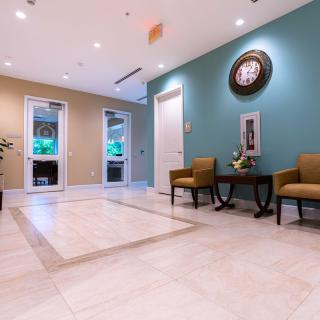 Modern lobby with comfortable seating and elegant decor.