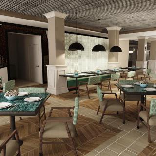 An empty, modern-designed restaurant interior with neatly arranged dining tables and chairs.
