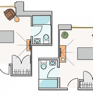 A detailed floor plan showing the layout of a small apartment with two bathrooms and a living area.