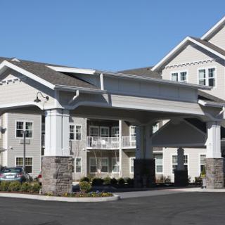 A modern hotel entrance showcasing contemporary architectural design.