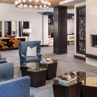 A modern lobby with comfortable seating and stylish decor.