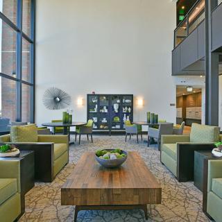 A modern lobby with stylish seating and natural light.