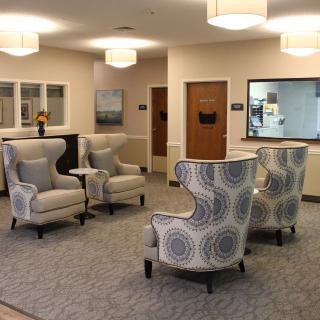 A modern lobby area with stylish seating arrangements and soft lighting.