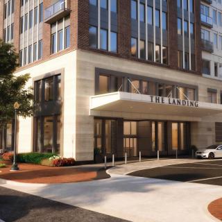 A modern building entrance with a street view.