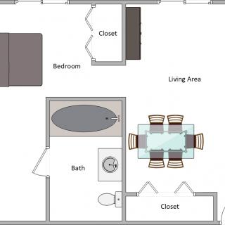 A simple floor plan featuring a bedroom, bathroom, living area, dining area, and closets.