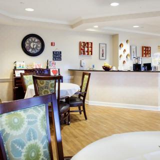 A cozy dining area with elegant seating and tasteful decor.