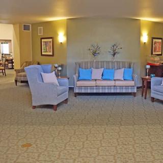 A cozy living room with stylish furniture and soft lighting.