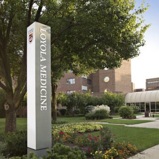 Loyola Medicine building surrounded by greenery.