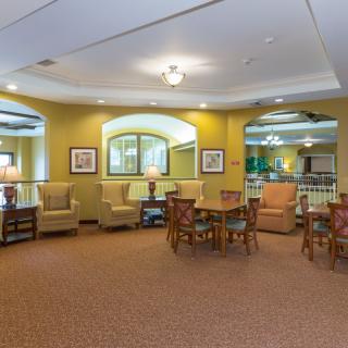 A cozy lounge area with comfortable seating and ambient lighting.