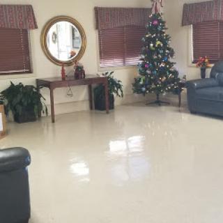 A cozy living room decorated for the holiday season.