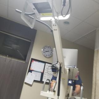 An X-ray machine set up in a medical facility.