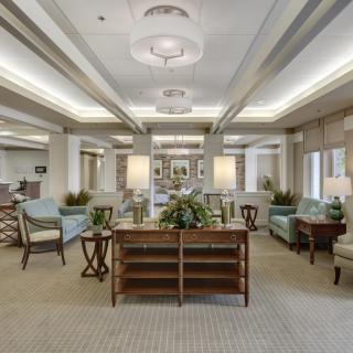 A modern lobby with stylish furniture and soft lighting.