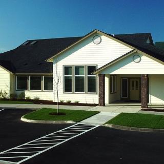 A modern suburban residential house with a clean and well-maintained exterior.