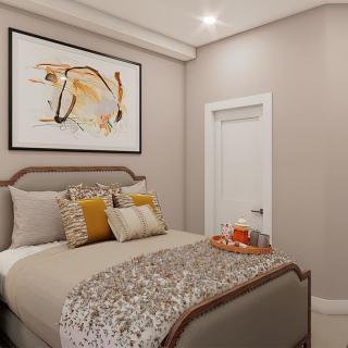 A cozy, modern bedroom with neutral colors and stylish artwork above the bed.