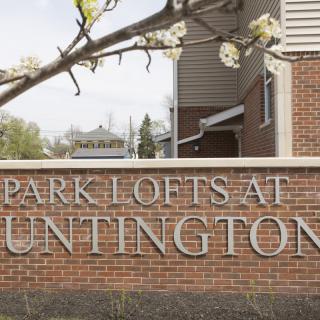 Entrance sign for Park Lofts at Huntington apartments.