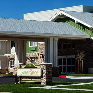 A modern building entrance with a prominent sign.