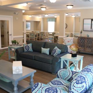 A modern living room with comfortable seating and stylish decor.