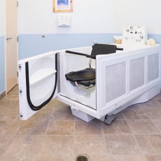 A specialized medical bath designed for therapeutic treatments.