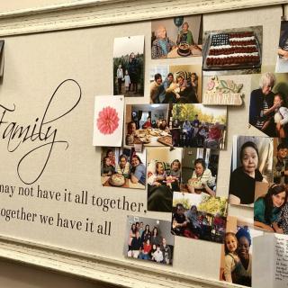 A collage of family photos arranged on a decorative board with an inscription celebrating togetherness.
