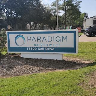 Signage for Paradigm located on Call Drive.
