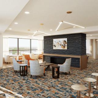 A modern hotel lobby with comfortable seating and contemporary design elements.