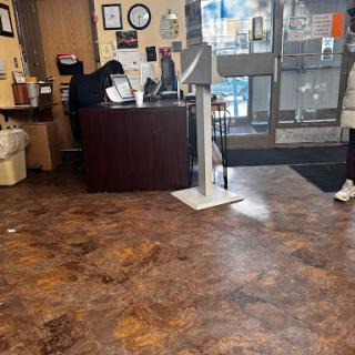A view of the lobby area with a reception desk and a welcoming atmosphere.