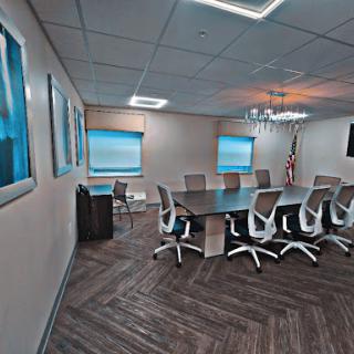 A modern conference room equipped for meetings and collaboration.