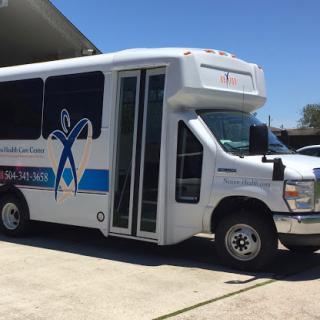 A shuttle bus designed for community healthcare services, featuring accessibility options.