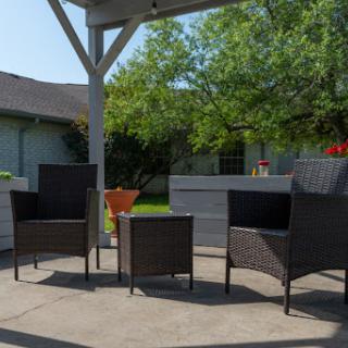 A cozy outdoor seating area with stylish chairs, perfect for relaxation.