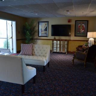A cozy lobby with comfortable seating and elegant decor.