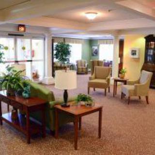 A cozy living room with comfortable seating and plenty of natural light.