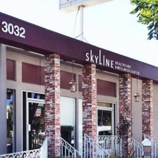 The exterior of a restaurant named Skyline, featuring a brick facade and an awning.