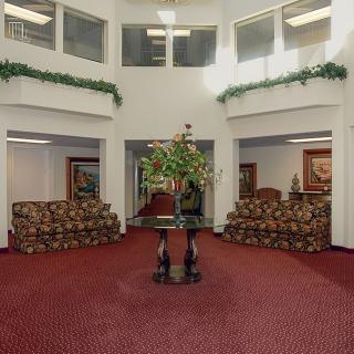A spacious lobby with elegant decor and comfortable seating arrangements.