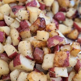 Deliciously roasted red and white diced potatoes, perfect as a side dish.
