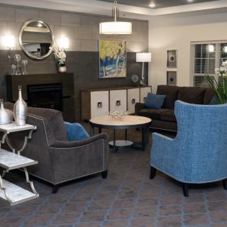 A modern living room featuring comfortable seating and contemporary decor.