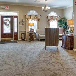 A well-decorated lobby area with furniture and ambient lighting.