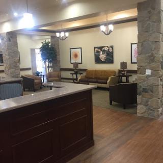 A welcoming lobby featuring comfortable seating and a modern reception area.