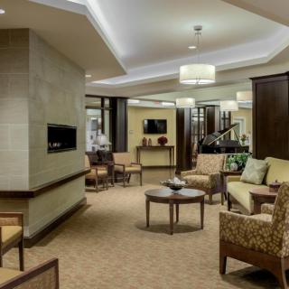 Modern lobby with comfortable seating and elegant lighting.