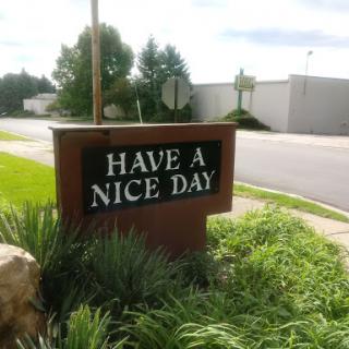 A cheerful message wishing everyone a nice day.