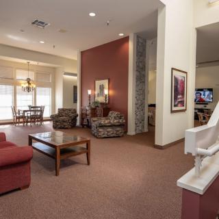 A spacious and cozy living room with comfortable seating and a coffee table.