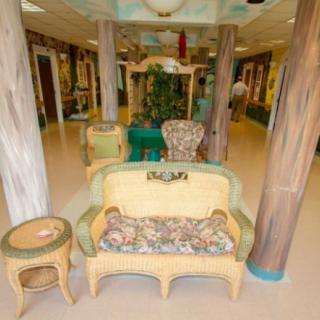 A colorful and inviting waiting area in a children's hospital, featuring child-friendly decor and comfortable seating.