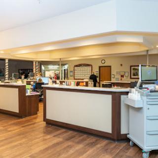 A modern hospital reception area with a clean and inviting design.