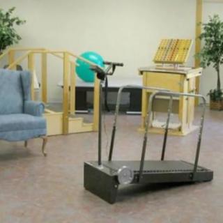 A physical therapy room equipped with various rehabilitation tools and equipment.